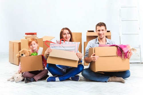 Local movers preparing boxes in Swiss Cottage