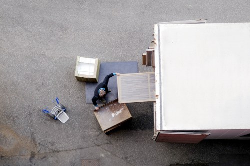 Packed boxes and furniture ready for removal transport