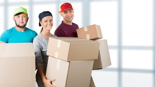 Careful loading of furniture into a removals van in Swiss Cottage