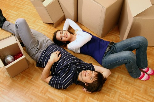Packed moving boxes and furniture ready for a Swiss Cottage home move